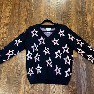 black sweater with stars